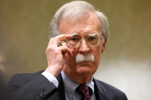 Former National Security Adviser John Bolton speaks to reporters after speaking on a panel hosted by the National Council of Resistance of Iran–U.S. Representative Office (NCRI-US) at the Willard InterContinental Hotel in Washington on Aug. 17, 2022. (Anna Moneymaker/Getty Images)