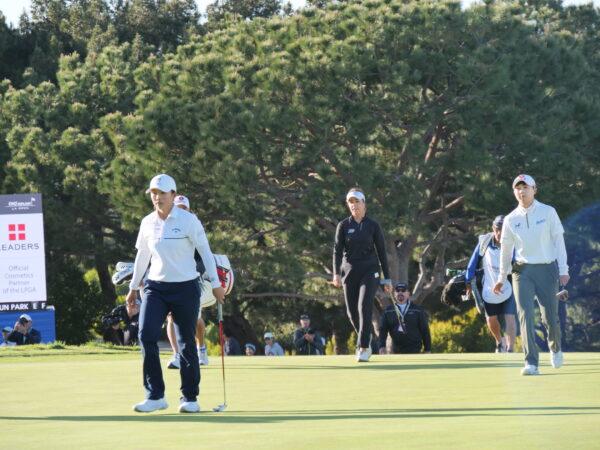 Running Yin (L), Georgia Hall (C), and Hyo Woo Kim (R) of the final group walks on the 18th green at the DIO Implant LA Open, at Palos Verdes Golf Club in Palos Verdes Estates, Calif., on April 2, 2023. (Nhat Hoang/The Epoch Times)