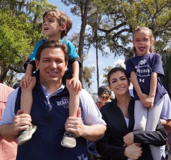 Florida Gov. Ron DeSantis—pictured here with his wife Casey and two of their children at The Players Championship in Ponte Vedra, Florida, on March 12, 2023—often notes that the couple got married at Disney World. (Courtesy of the Office of Gov. Ron DeSantis.)