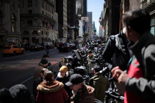 Members of the media wait outside Trump Tower as former President Donald Trump is expected to arrive after his indictment by a Manhattan grand jury in New York City on April 3, 2023. (Carlos Barria/Reuters)