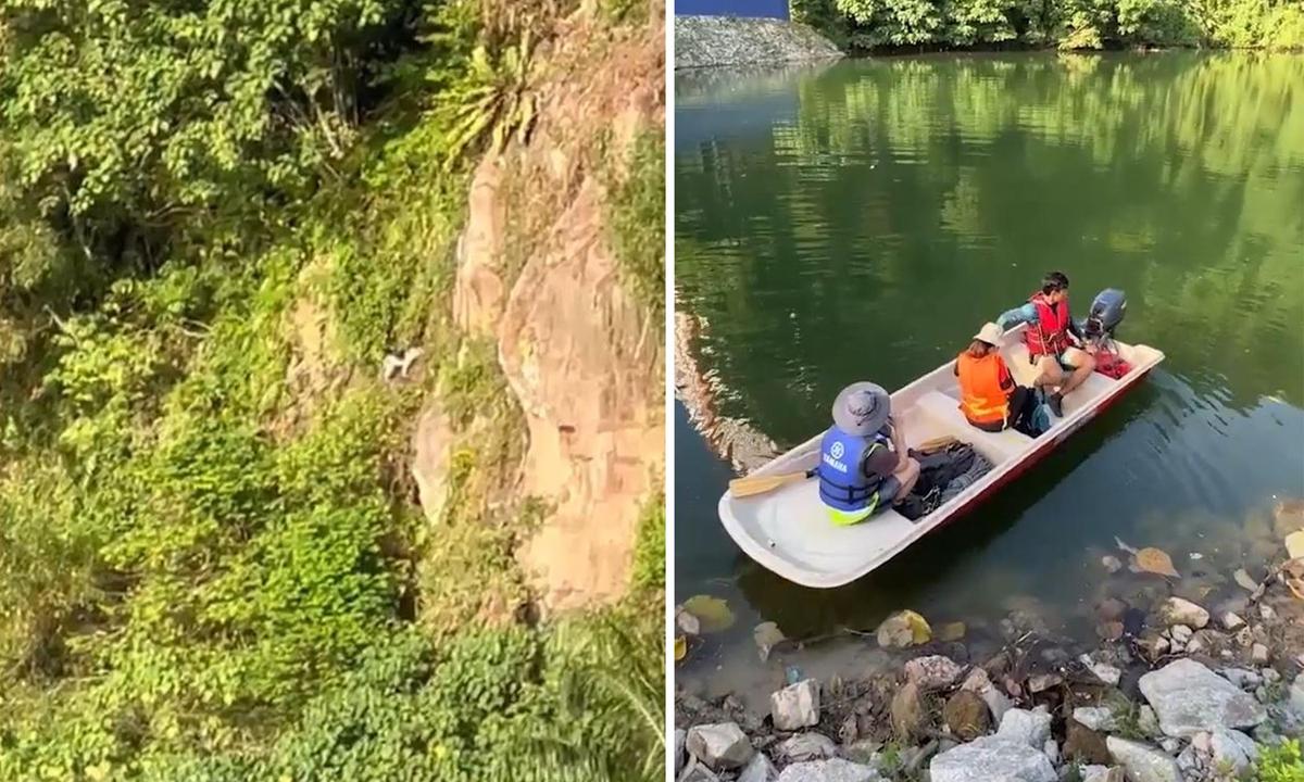 Rescuers spot a dog stranded on a cliffside in Petaling Jaya city, Malaysia, on March 19 and set out to rescue it. (Screenshot/Newsflare)