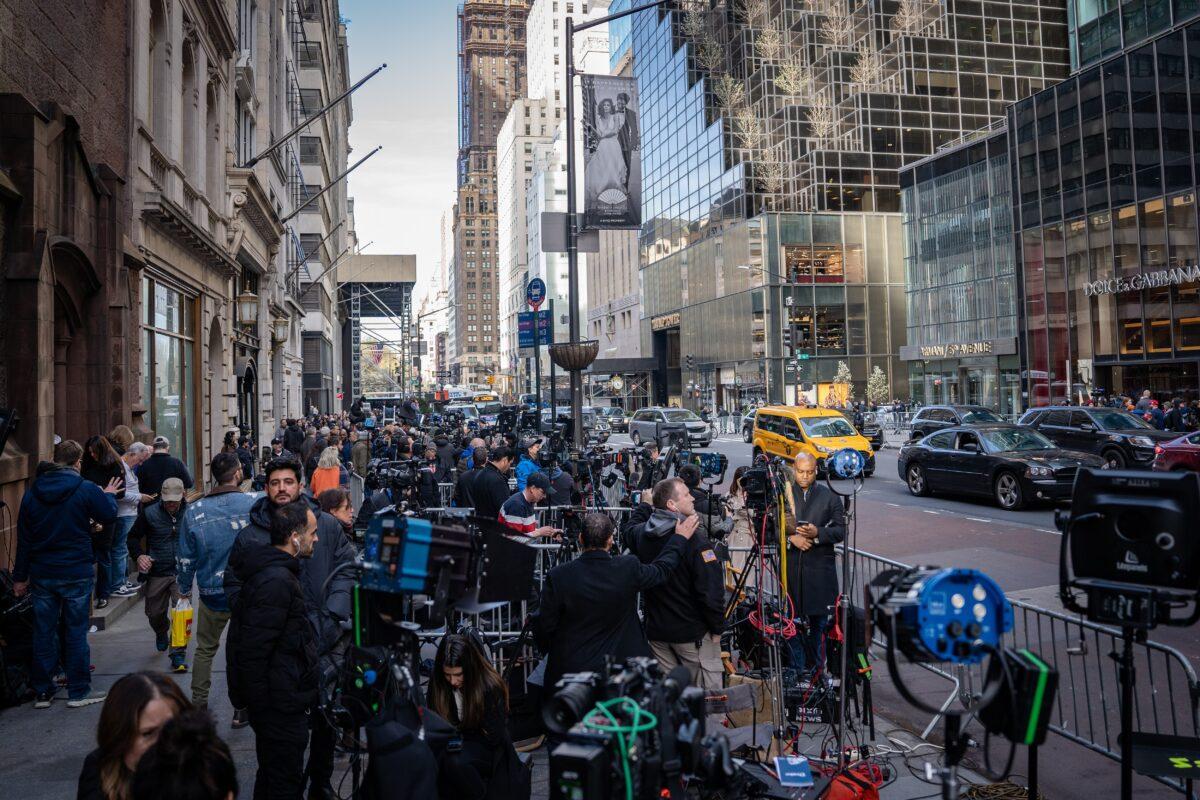 Media gather near Trump Tower in New York City on April 3, 2023. Former President Donald Trump is scheduled to be arraigned on April 4 at Manhattan Supreme Court following his indictment by a grand jury on March 30, 2023.(Samira Bouaou/The Epoch Times)