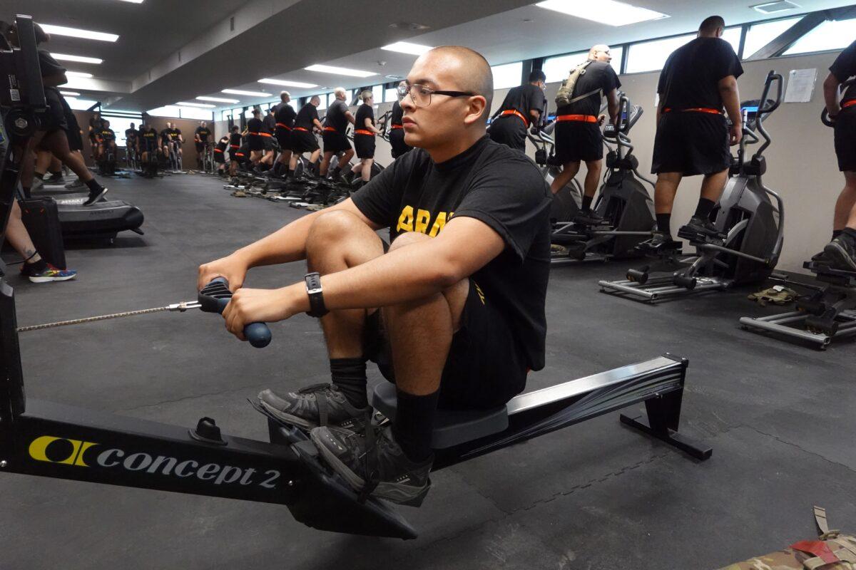 U.S. Army trainees participating in the Army's new Future Soldier Prep Course learn how to properly use exercise equipment during a physical training session at Fort Jackson in Columbia, S.C., on Sept. 28, 2022. (Scott Olson/Getty Images)