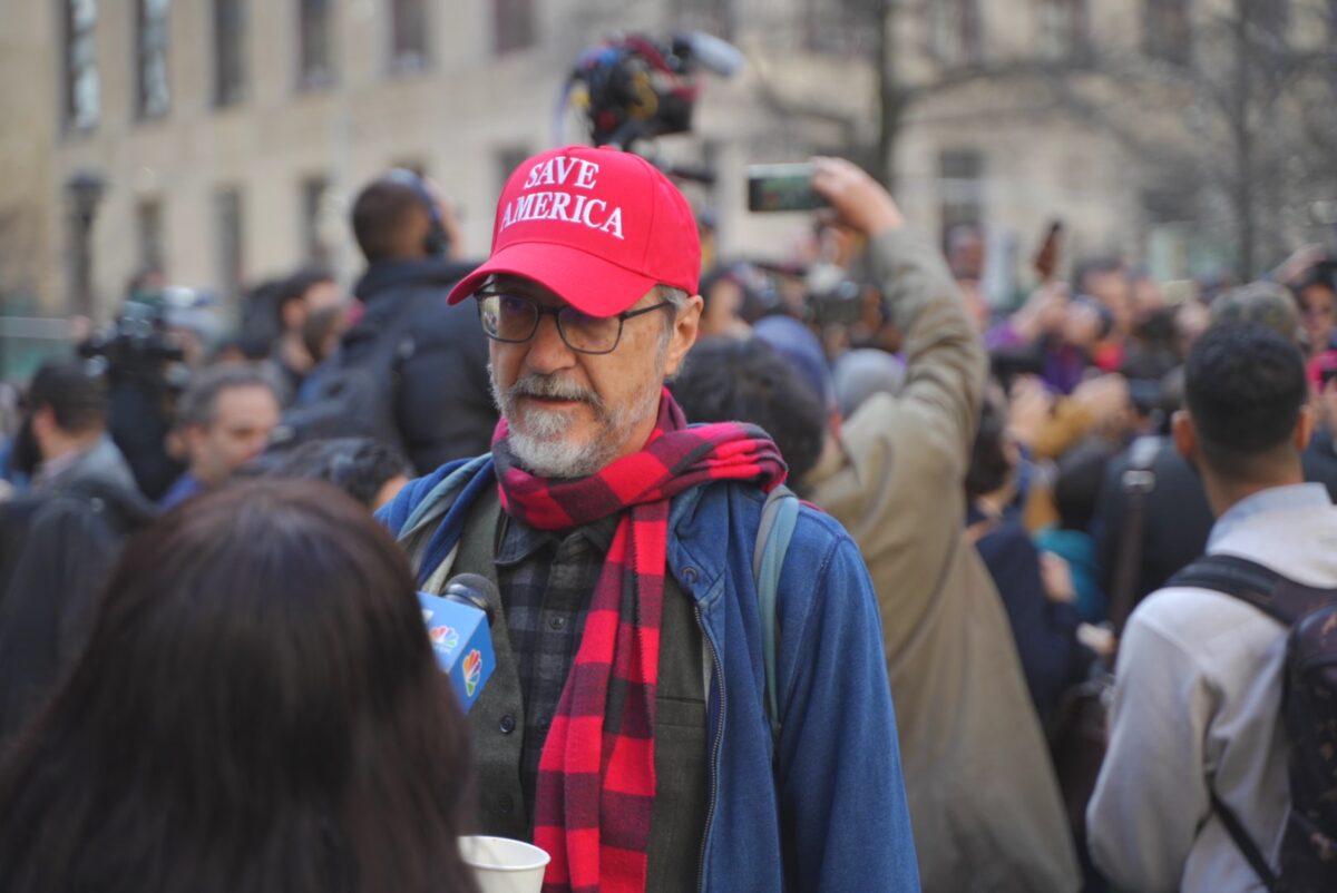 Protesters outside the New York County Criminal Court ahead of former President Donald Trump's arraignment on April 4, 2023. (Chung I Ho/The Epoch Times)