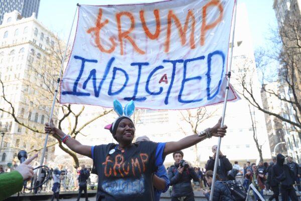 Nadine Seiler of Waldorf, Maryland, celebrates the indictment of former President Donald Trump ahead of his arraignment in New York on April 4, 2023. (Chung I Ho/The Epoch Times)