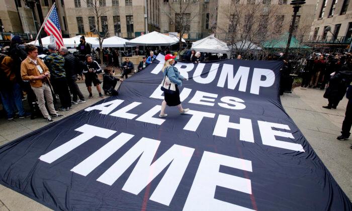 Photos: Protesters Rally Outside Manhattan Courthouse Ahead of Trump Arraignment