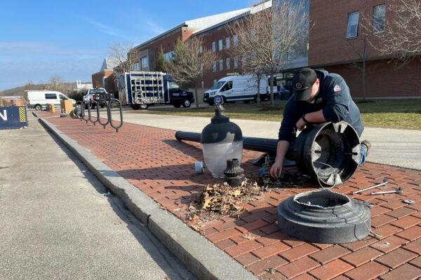 A street light is repaired at UConn in Storrs, Conn., on April 4, 2023. (Pat Eaton-Robb/AP Photo)