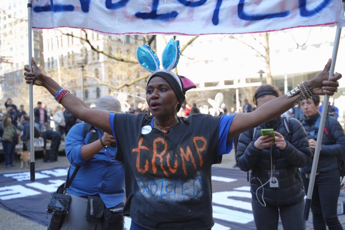 Nadine Seiler, a protester in support of the Trump indictment, outside a Manhattan courthouse on April 4, 2023. (Chung I Ho/The Epoch Times)