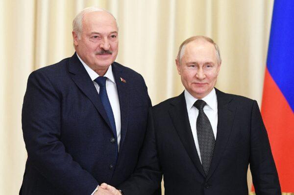 Russian President Vladimir Putin (R) meets with his Belarusian counterpart Alexander Lukashenko at the Novo-Ogaryovo state residence, outside Moscow, on Feb. 17, 2023. (Vladimir Astapkovich/Sputnik/AFP via Getty Images)