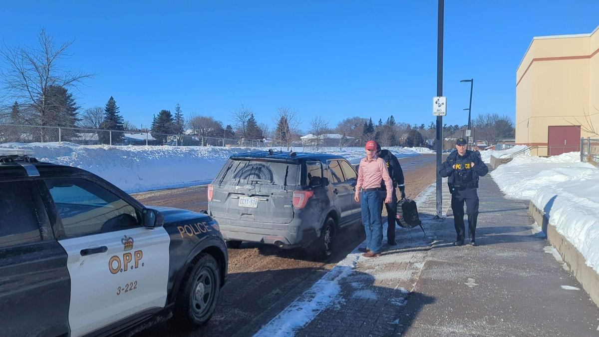 Josh Alexander being arrested at St. Joseph Catholic High School in Renfrew County, Ontario, on Feb. 6, 2023. (Courtesy of Josh Alexander)