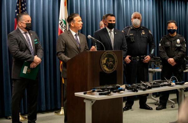 California Attorney General Rob Bonta discusses the seizure of 114 guns during a five-day sweep across the Los Angeles area during a news conference held at the California Department of Justice's Office in Los Angeles on Feb. 22, 2022. (Eric Licas/The Orange County Register via AP)