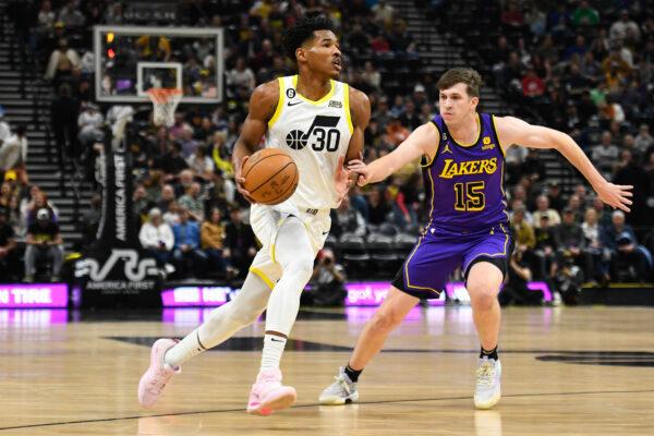Austin Reaves (15) of the Los Angeles Lakers defends against Ochai Agbaji (30) of the Utah Jazz during the first half at Vivint Arena in Salt Lake City on April 4, 2023. (Alex Goodlett/Getty Images)