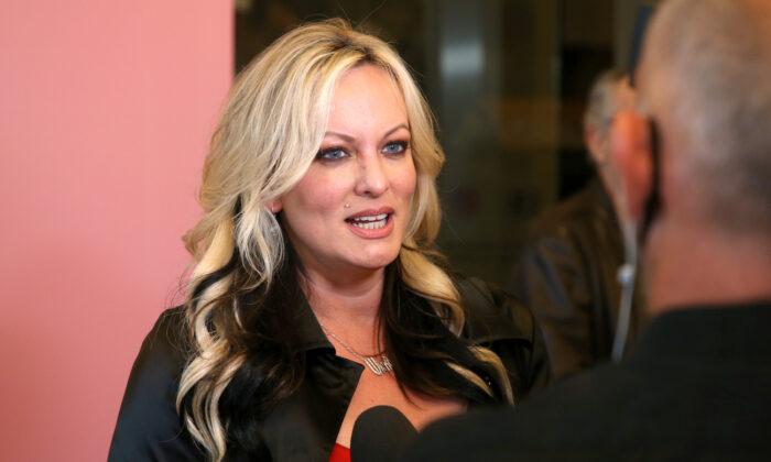 Stormy Daniels Takes Witness Stand in Trump Trial, Alleges ‘Apprentice’ Offer