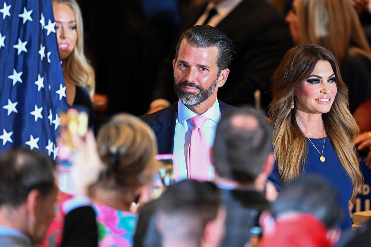 Donald Trump Jr. and Kimberly Guilfoyle attend former President Donald Trump's press conference following his court appearance over an alleged hush-money payment, at his Mar-a-Lago estate in Palm Beach, Fla., on April 4, 2023. (Chandan Khanna/AFP via Getty Images)