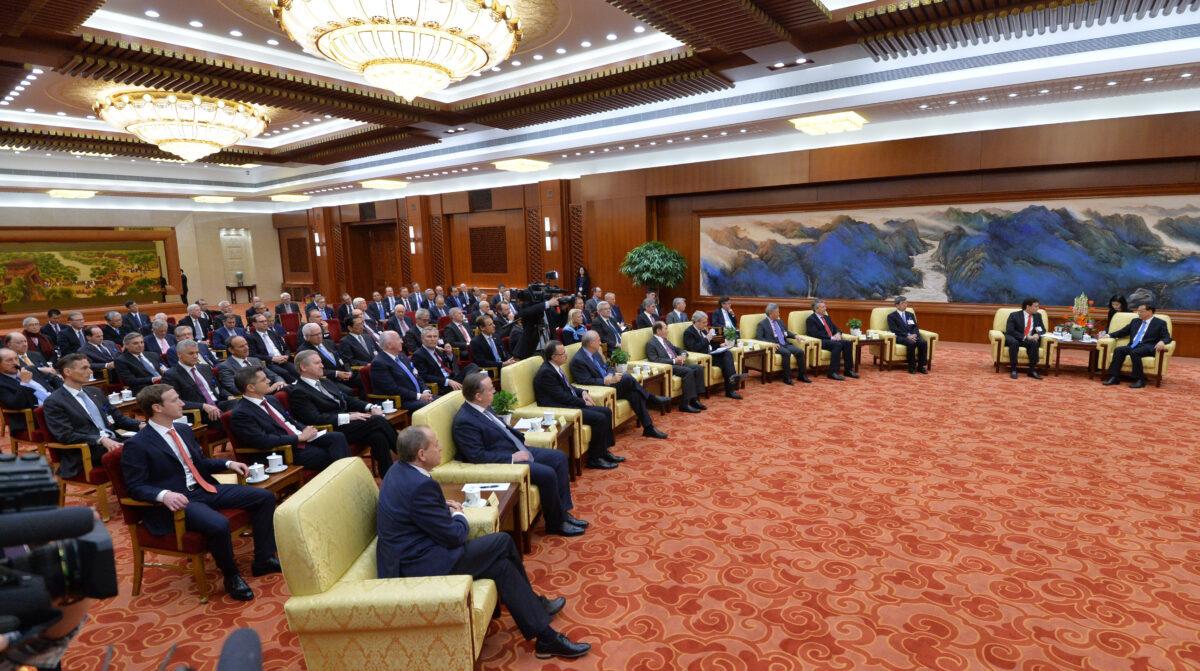 Overseas representatives of China Development Forum including Mark Zuckerberg, Facebook CEO (L) attend a meeting in Great Hall of the People at the Great Hall of the People in Beijing, on March 21, 2016. (Kenzaburo Fukuhara - Pool/Getty Images)