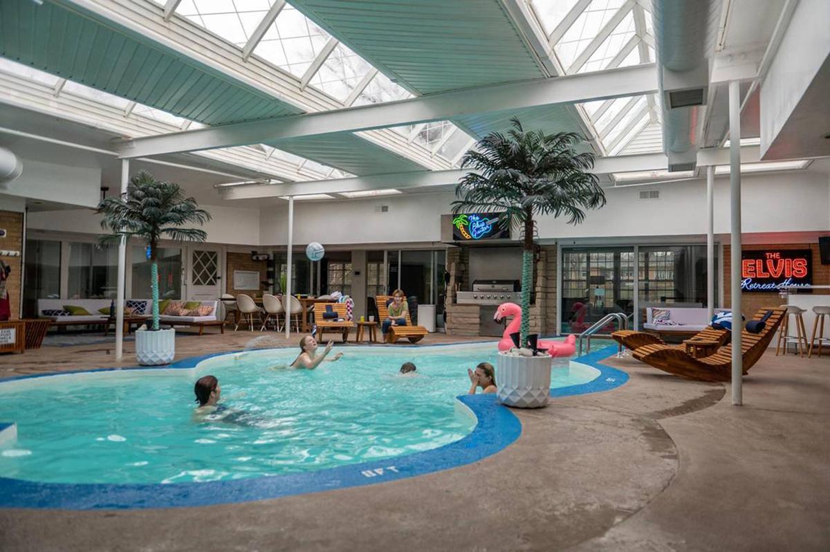 The main attraction at the Elvis Retreat House is the indoor, guitar-shaped swimming pool. It is heated and open to guests year-round. (Emily Curiel/The Kansas City Star/TNS)