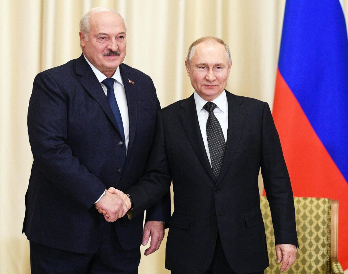Russian President Vladimir Putin (R) meets Belarusian counterpart Alexander Lukashenko at the Novo-Ogaryovo state residence near Moscow on Feb. 17, 2023. (Vladimir Astapkovich/SPUTNIK/AFP via Getty Images)