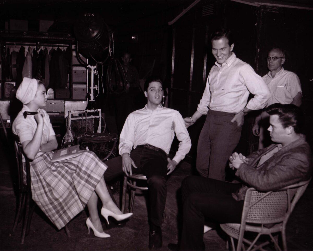Boone, Elvis Presley (C), and friends meet up while filming at the 20th Century Fox Studios for their movies “All Hands on Deck” and “Wild in the Country,” circa 1960. (Courtesy of Pat Boone)