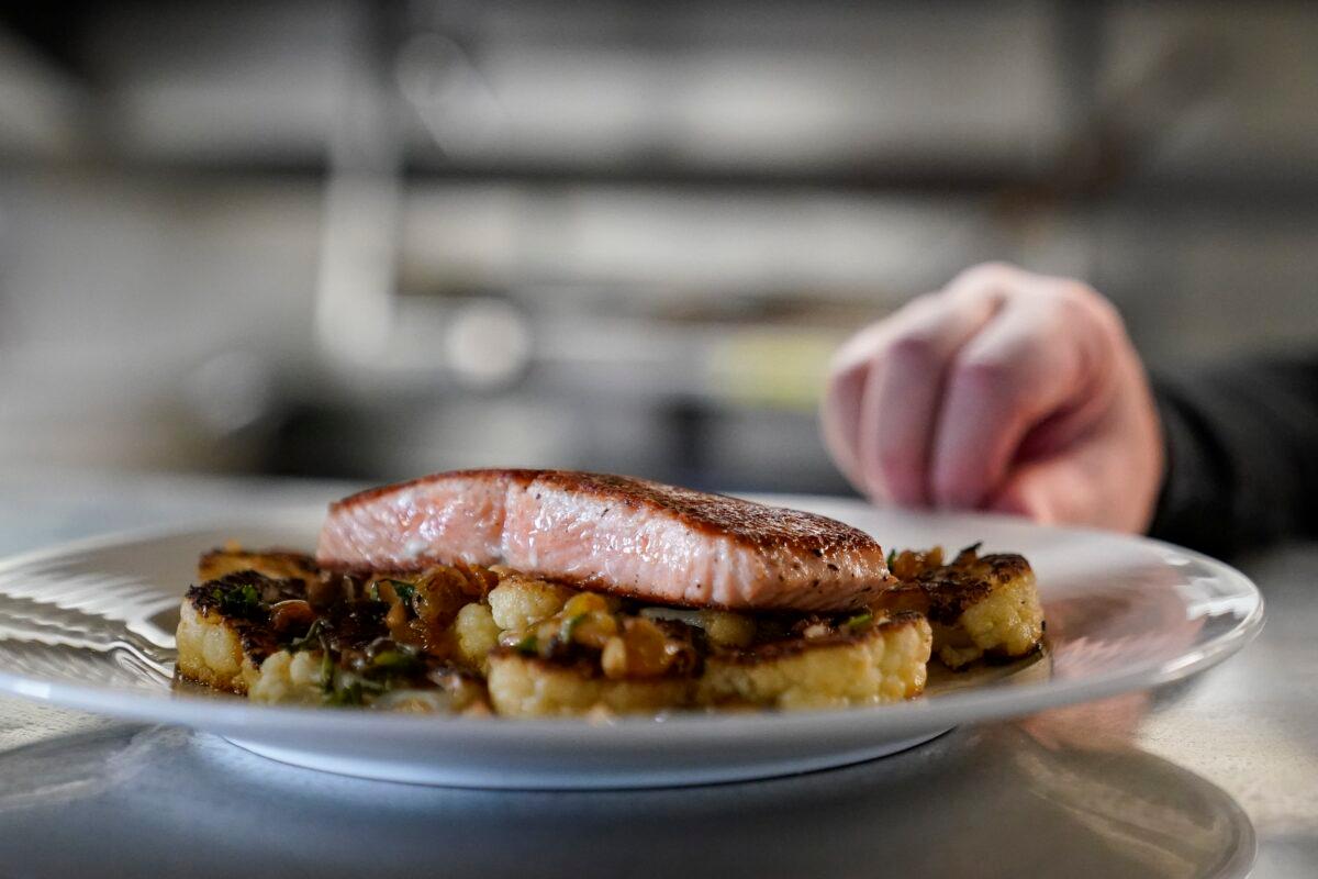 A farm-raised salmon dish at Scoma's sits before being served to a customer in San Francisco on March 20, 2023. (Godofredo A. Vásquez/AP Photo)