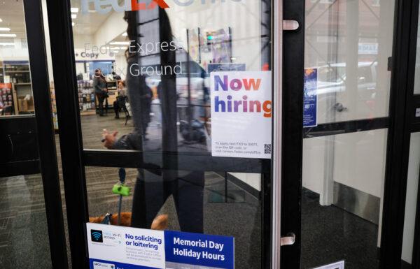 A "now hiring" sign in a Manhattan store in New York City on May 6, 2022. (Spencer Platt/Getty Images)