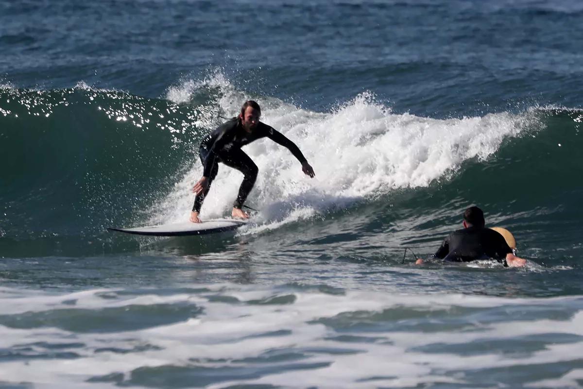 Braden Walker rides a wave at Westward Beach in Malibu, California. (Luis Sinco/Los Angeles Times/TNS)