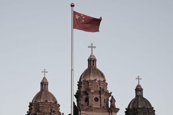 The Chinese national flag flies in front of St Joseph's Church, also known as Wangfujing Catholic Church, in Beijing on Oct. 22, 2020. (Greg Baker/AFP via Getty Images)