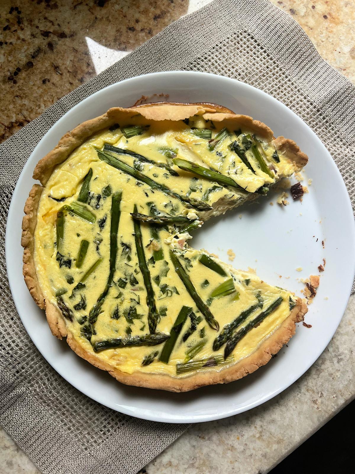 This light and airy quiche features one of spring's first vegetables, asparagus. (Gretchen McKay/Pittsburgh Post-Gazette/TNS)