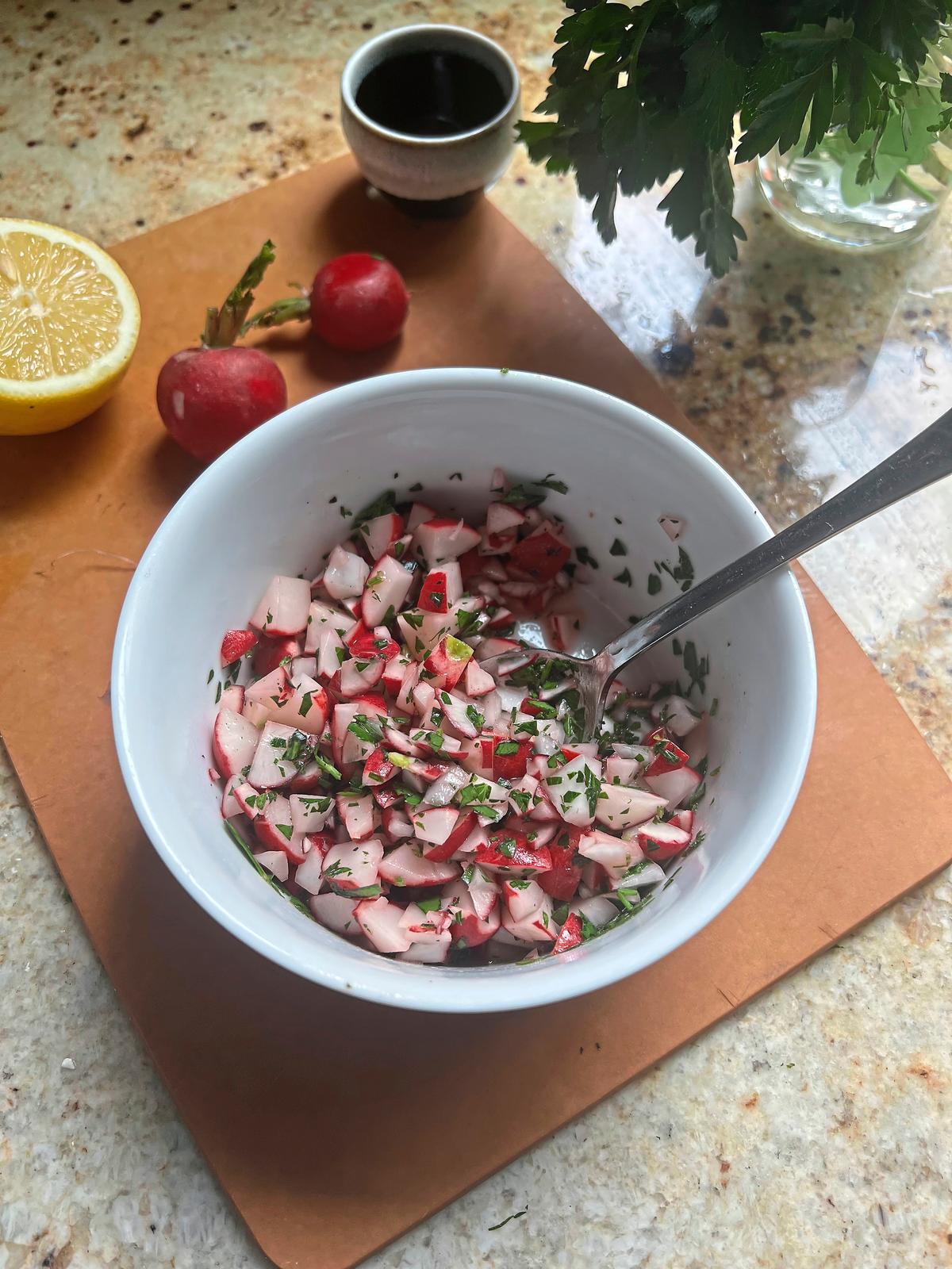 This refreshing spring salad made with radishes, lemon and parsley will add a pop of color to the dinner table. (Gretchen McKay/Pittsburgh Post-Gazette/TNS)