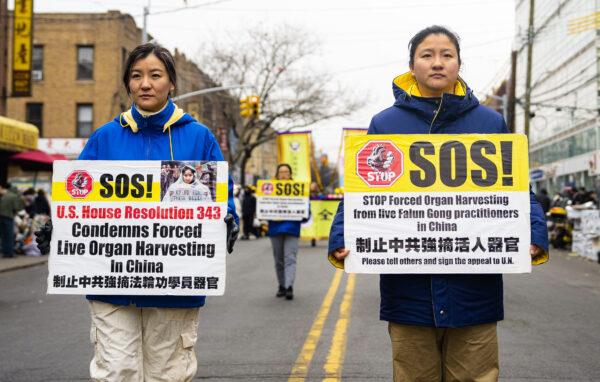 Falun Gong practitioners walk in a parade in Brooklyn, N.Y., highlighting the Chinese regime's persecution of their faith, on Feb. 26, 2023. (Chung I Ho/The Epoch Times)