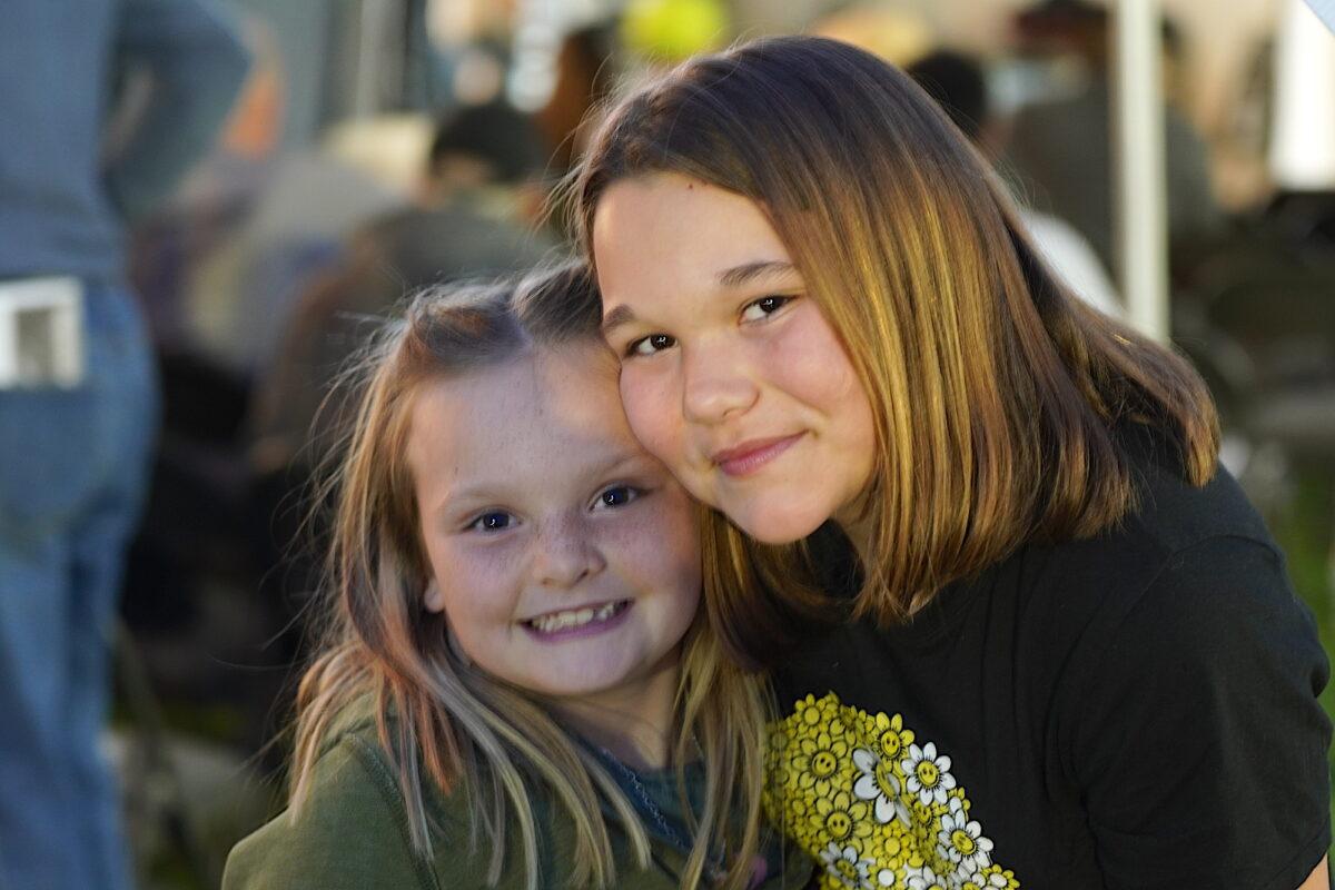 Families with children made up a large proportion of the congregation that attended a church revival ministry in Bakersfield, Calif., on March 12, 2023. (Allan Stein/The Epoch Times)