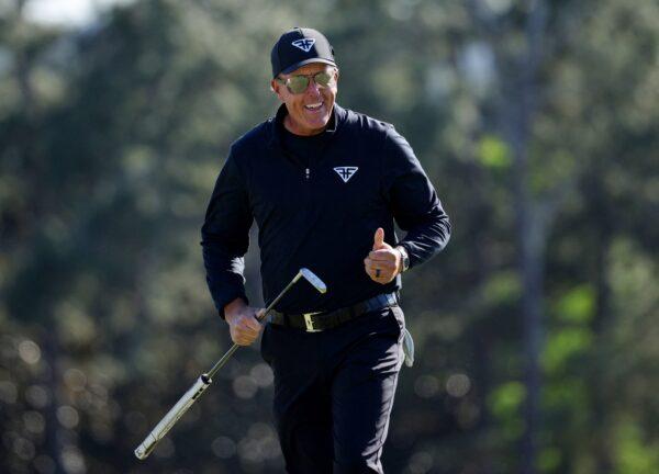 Phil Mickelson of the U.S. reacts after putting for birdie on the 18th hole and completing his final round in the match of The Masters, Augusta, Ga., on April 9, 2023. (Brian Snyder/Reuters)