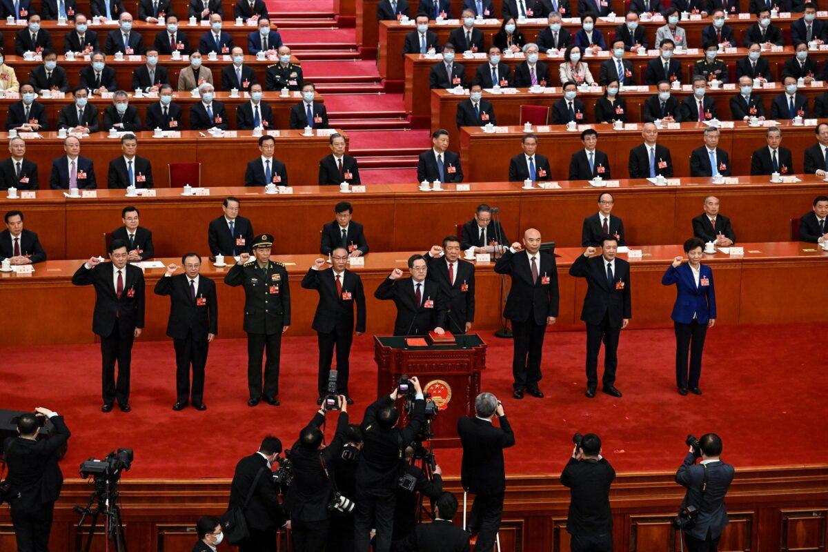 China's Defense Minister Gen. Li Shangfu (third from left) is among senior Chinese Communist Party officials sworn into their new offices during a National People's Congress in Beijing on March 12, 2023. (Noel Celis/AFP via Getty Images)