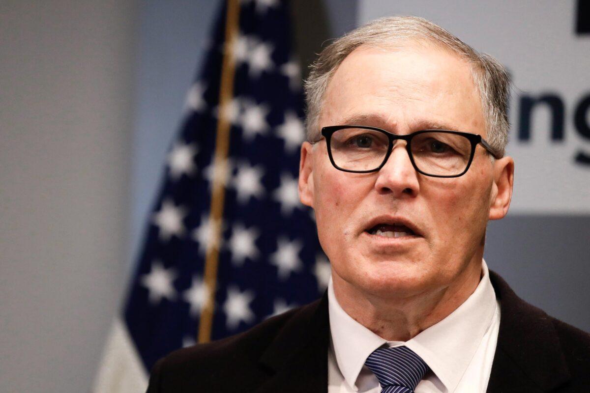 Washington Gov. Jay Inslee provides details about a temporary statewide shutdown of restaurants, bars, and entertainment and recreational facilities to mitigate the effects of the COVID-19 outbreak at a press conference in Seattle on March 16, 2020. (Elaine Thompson/Getty Images)