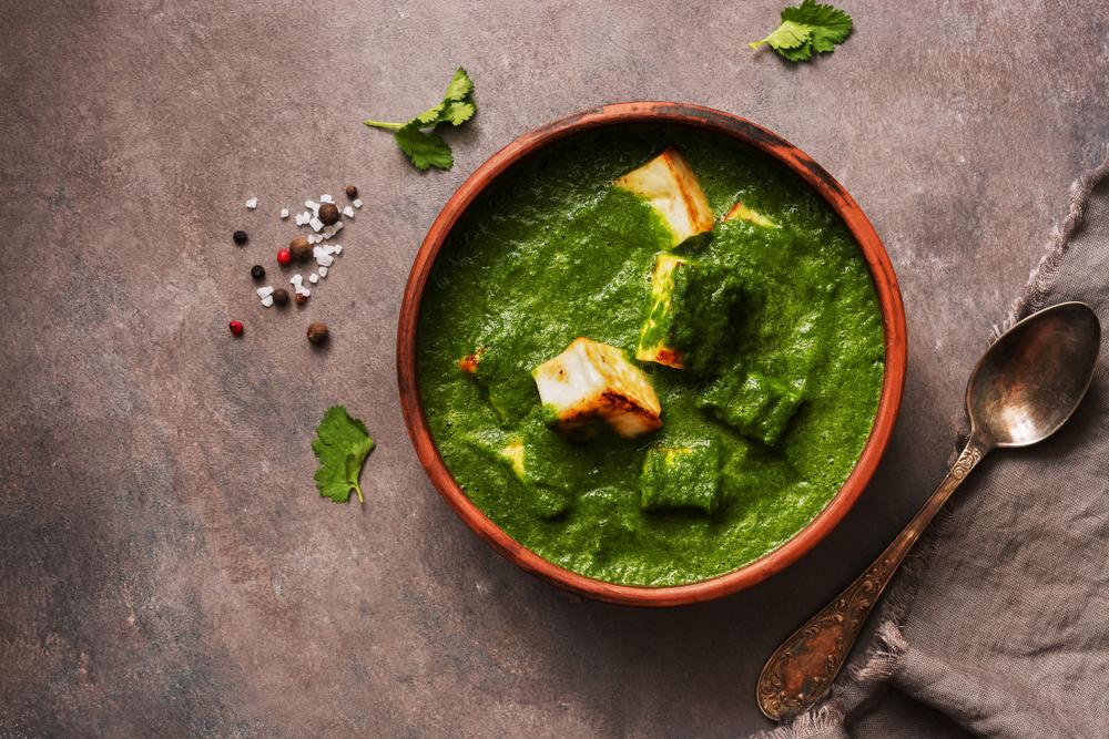C24<br/>Indian saag paneer combines earthy, spicy veggies with meaty chunks of creamy cheese. (Yulia Gust/Shutterstock)