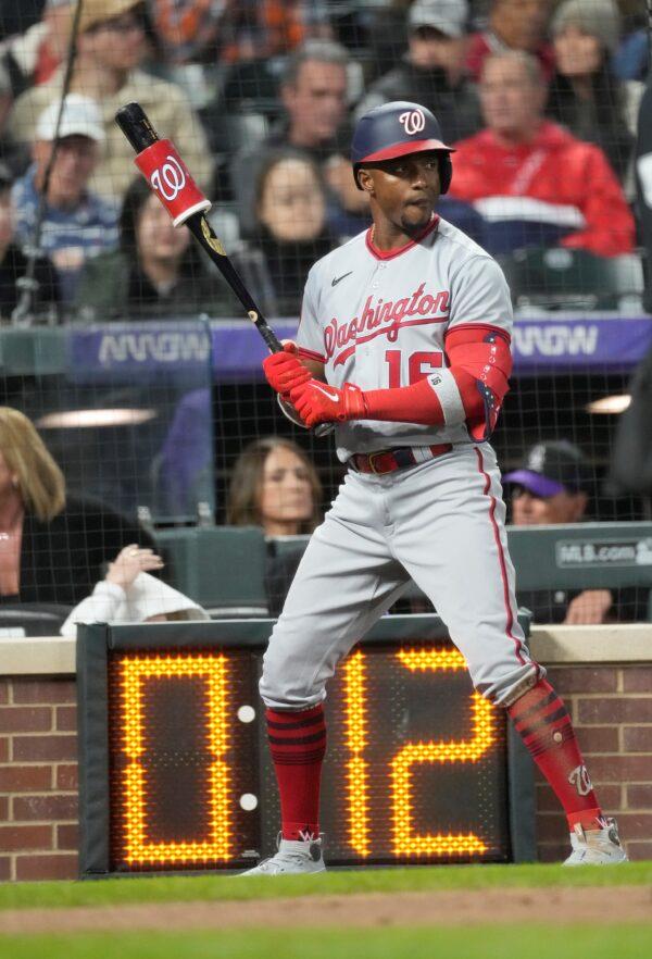 The pitch clock counts down as Washington Nationals' Victor Robles waits in the on-deck circle in the sixth inning of a baseball game against the Colorado Rockies in Denver on April 8, 2023. (David Zalubowski/AP Photo)