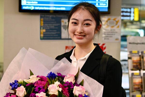 Shen Yun emcee Teresa Du at Wellington Airport, in New Zealand, on April 12, 2023. (The Epoch Times)