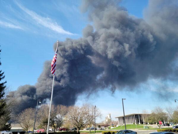 Smoke rises from an industrial fire at 358 NW F Street, in Richmond, Ind., on April 11, 2023. (Zach Piatt/The Palladium-Item via AP)