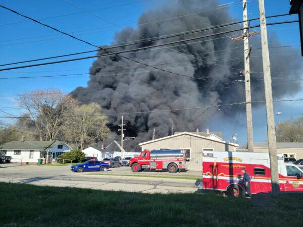 Smoke rises from an industrial fire at 358 NW F Street, in Richmond, Ind., on April 11, 2023. (Zach Piatt/The Palladium-Item via AP)