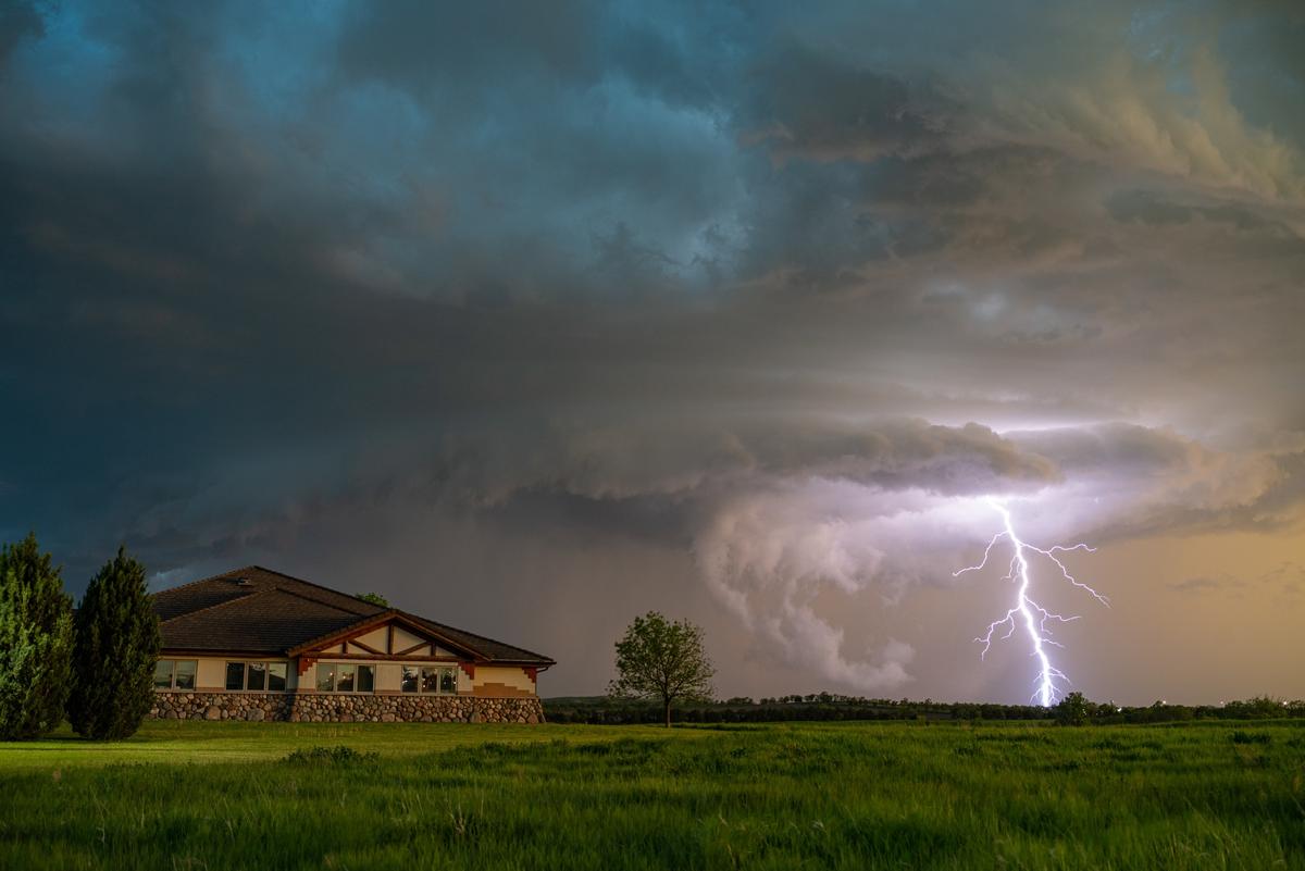 A cloud-to-ground lightning bolt is seen during a mesocyclone in Mission, South Dakota. (Courtesy of <a href="https://www.facebook.com/5elementsxposure">Gunjan Sinha</a>)