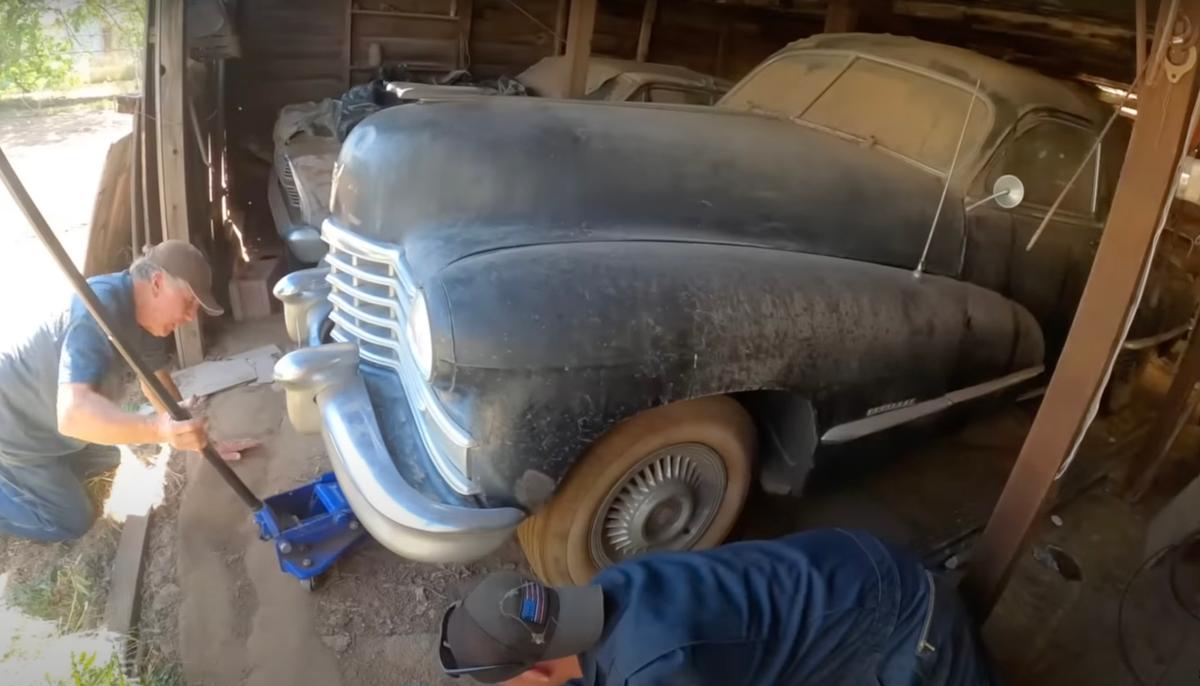 Harry gets his father's 1946 Cadillac out of storage where it had been for 50 years. (Courtesy of Jerry Heasley)