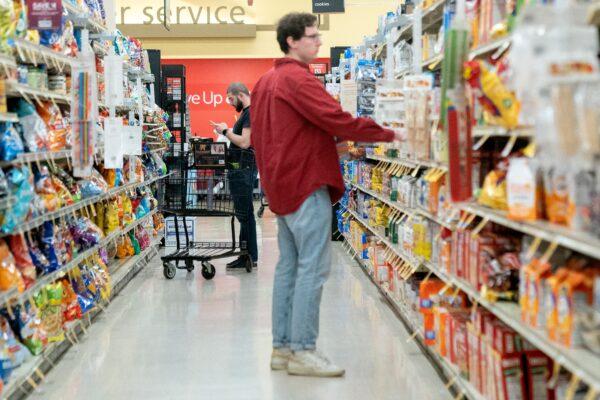 Shoppers look at items displayed at a grocery store in Washington on Feb. 15, 2023. (Stefani Reynolds/AFP via Getty Images)