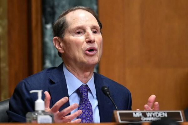 Sen. Ron Wyden (D-Ore.) speaks during a Senate Finance Committee hearing in the Dirksen Senate Office Building on Capitol Hill, on Oct. 19, 2021. (Mandel Ngan/Pool via Reuters)
