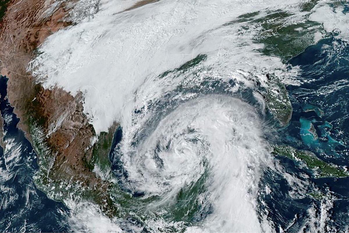 A satellite image shows tropical storm Hanna, which is expected to strengthen to a hurricane, in the Gulf of Mexico, approaching the coast of Louisiana, on Oct. 27, 2020. (NOAA/Handout via Reuters)
