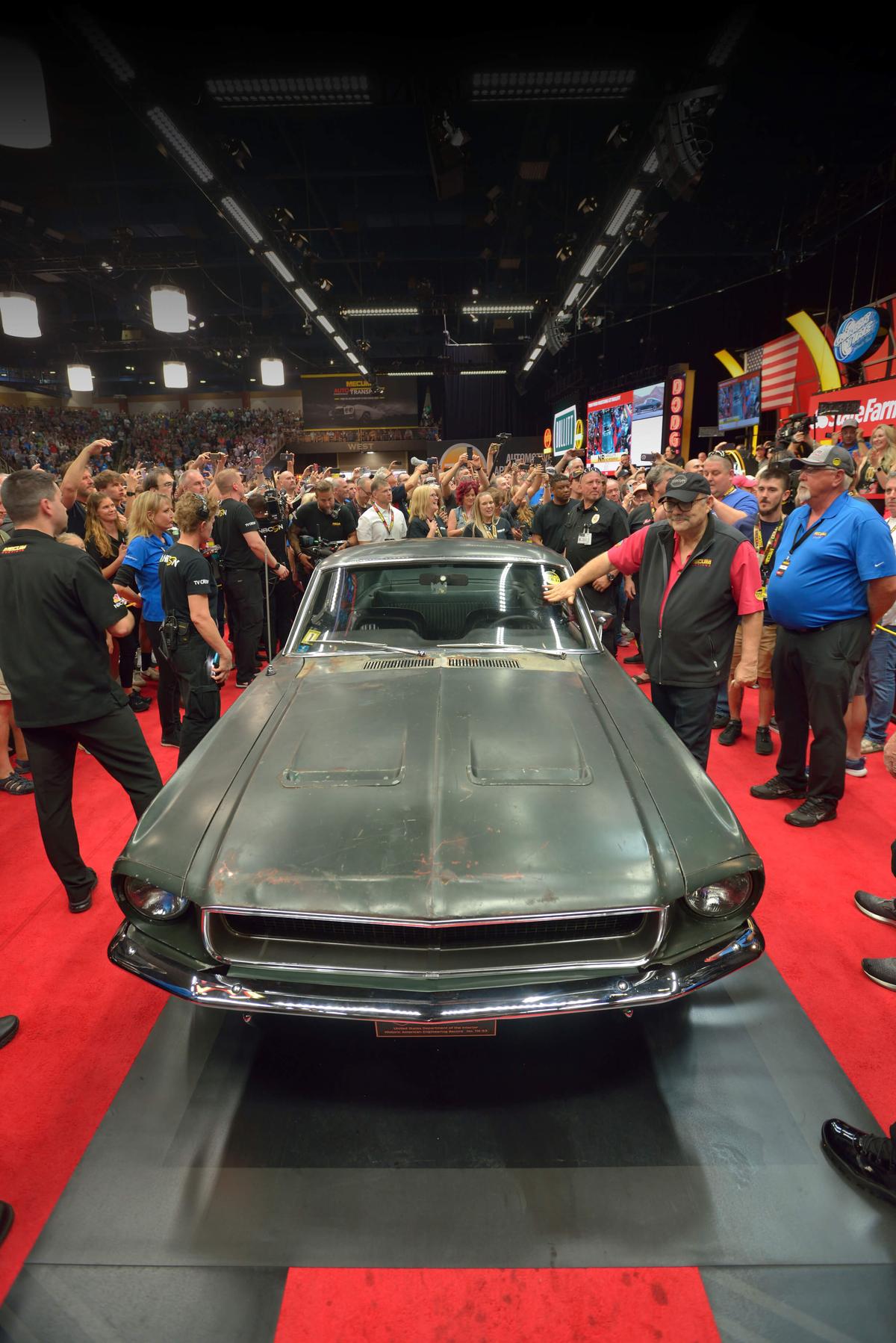 Auto auctions are an exciting, lively way to purchase collectible cars. But when the hammer goes down, you just bought it "as is," so be careful before raising your hand. (Courtesy of Mecum Auctions)