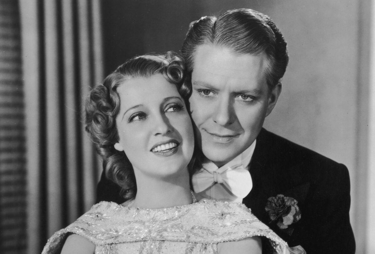 American singers and actors Nelson Eddy (R) and Jeanette MacDonald pose in a still from the film "Sweethearts" in 1938. (Hulton Archive/Getty Images)