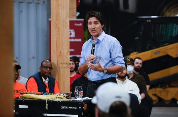 Prime Minister Justin Trudeau speaks during a town hall meeting at the Manitoba Building Trades Institute in Winnipeg on April 12, 2023. (The Canadian Press/John Woods)