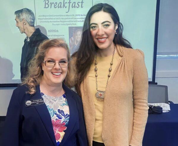 Mira Victor (R) meets with Fountain Valley Mayor Kim Constantine (L) at the City Mayor's Breakfast in Fountain Valley, Calif., on March 30, 2023. (Courtesy of Mira Victor)