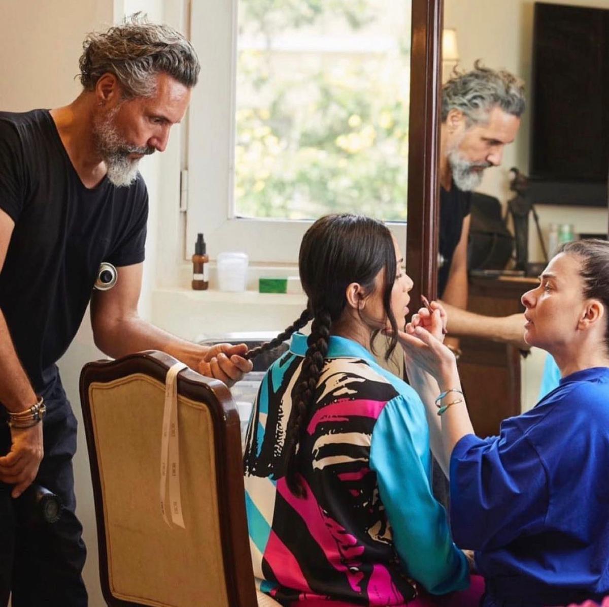 Gabriel Georgiou styling Frieda Pinto's hair for the 2023 Dior show. (Courtesy of Trisha Sarang)