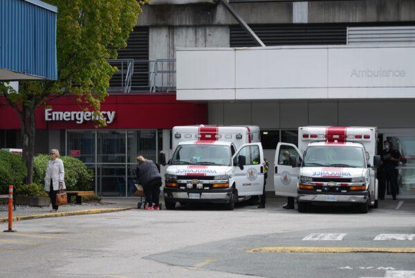 Paramedics and ambulances outside the Emergency Department of Burnaby Hospital in Burnaby, B.C., on May 30, 2022. (The Canadian Press/Darryl Dyck)