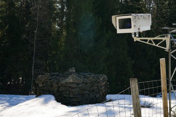 A surveillance camera installed near the border fence with Russia in Pelkola, Finland, on April 14, 2023. (Janis Laizans/Reuters)
